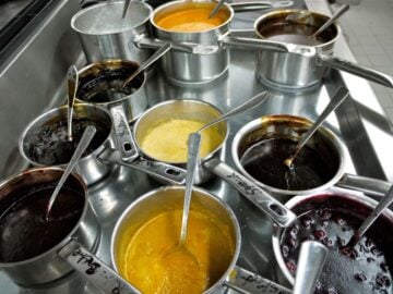 many pots filled with different sauces