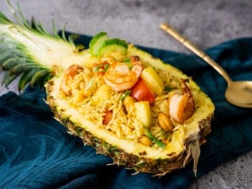 pineapple fried rice in a pineapple bowl