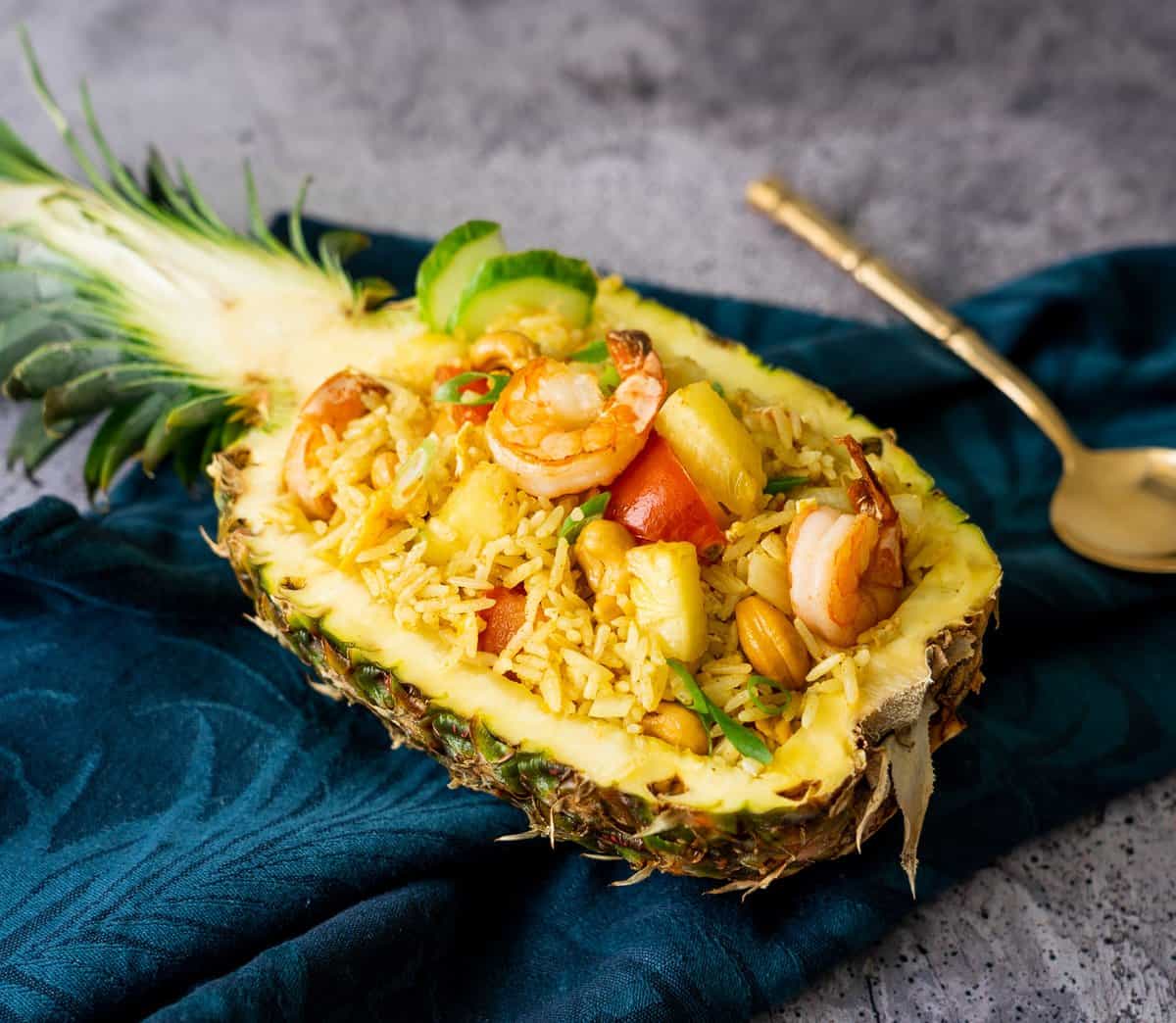 https://hot-thai-kitchen.com/wp-content/uploads/2014/02/Pineapple-fried-rice-new-blog.jpg