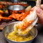 shrimp being dipped into a bowl of sauce with text "the best sauce for seafood Thai nam jim seafood" and "hot-thai-kitchen.com"