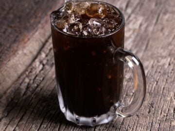 a glass of Thai black iced coffee