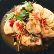 A plate of THai fish stir fry with Thai herbs
