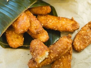 fried bananas in a banana leaf cone.