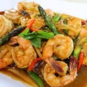 a plate of shrimp and chili paste stir fry.