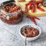 Thai chili paste in a bowl and in a glass jar.