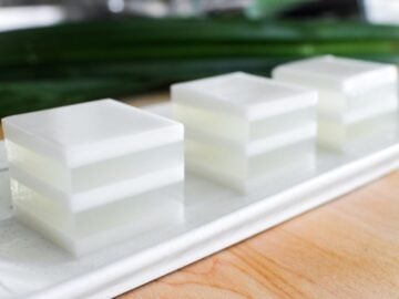 a plate of 3 cubes of coconut jelly duo