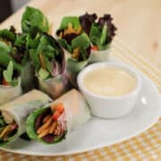 SaladNot your average salad rolls! These Thai salad rolls are beautiful, healthy, and easy to make. Comes with a creamy, garlicky dipping sauce that's got a spicy kick. Keep it vegetarian or add some meat! #saladrolls #vegetarian #healthy #thai #veggie #reciperolls