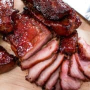 This easy Chinese BBQ pork recipe will beat anything you buy! Juicy, flavourful pork shoulder roast is perfect for this. Serve with rice, or top a salad for a low carb meal! #Chineserecipe #asianrecipe #chinesebbq #bbq #pork #charsiu #grilling