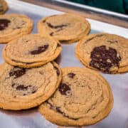 These are by far the best chocolate chip cookies I’ve ever made, and I’ve made a LOT in my life! The secret is in the “aging” of the dough. Crispy edges, chewy middle, just perfect. #cookies #chocolatechipcookies #christmasbaking #christmascookies #ediblegift #baking #chocolate