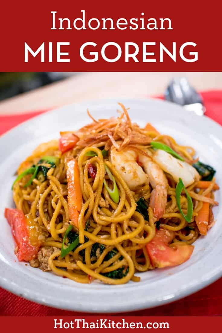 Mie goreng is a classic Indonesian dish that will please the family! Chewy egg noodles stir-fried in a sweet-salty sauce, with lot of crunchy veggies and juicy tomatoes. #easymeal #weeknightrecipe #eggnoodles #asianrecipe #indonesianfood 