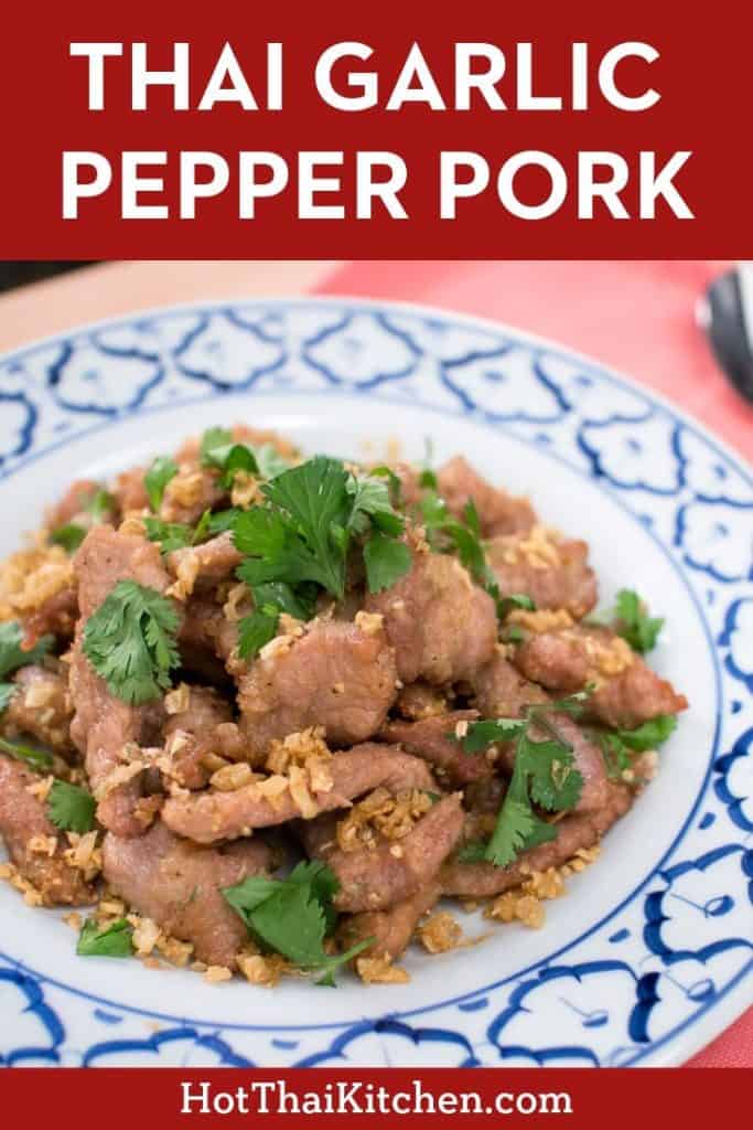Marinated tender pork topped with crispy fried garlic. A popular classic Thai street food recipe that’s perfect with a cold drink! #thaifood #porkrecipe #thairecipe 