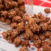 candied peanuts pouring out of a jar