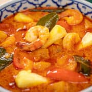 A bowl of pineapple curry with shrimp