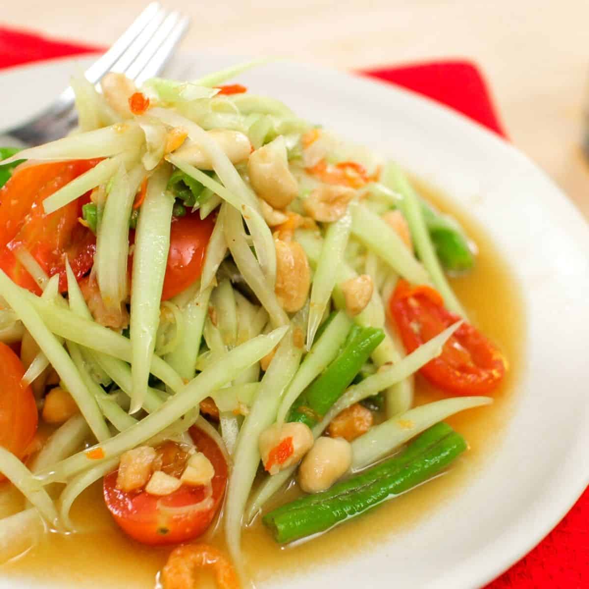 A plate of Thai green papaya salad