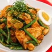 A plate of chicken and long bean stir-fry