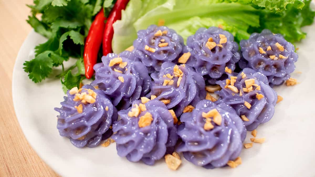 The pinces de Thai Chor Muang recette. /2pcs avec inscription fleur en forme de boulette