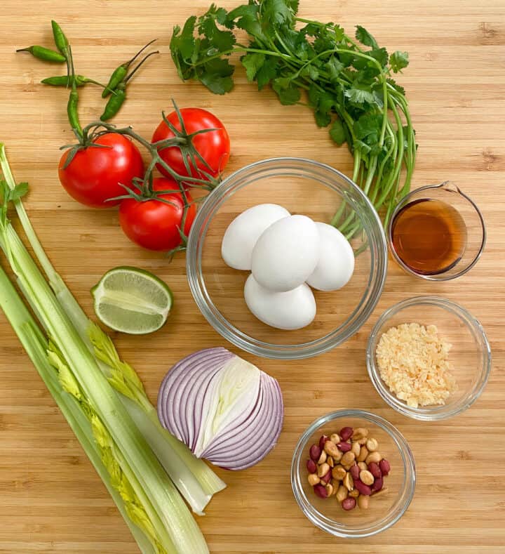 Ingredients for making fried egg salad.