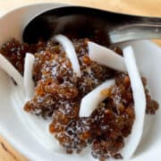 A bowl of sago pudding with young coconut meat