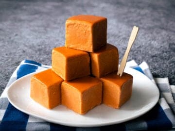 A plate of Thai tea ice cream cubes