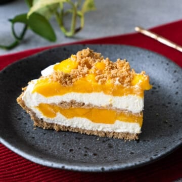 a slice of mango royale on a plate