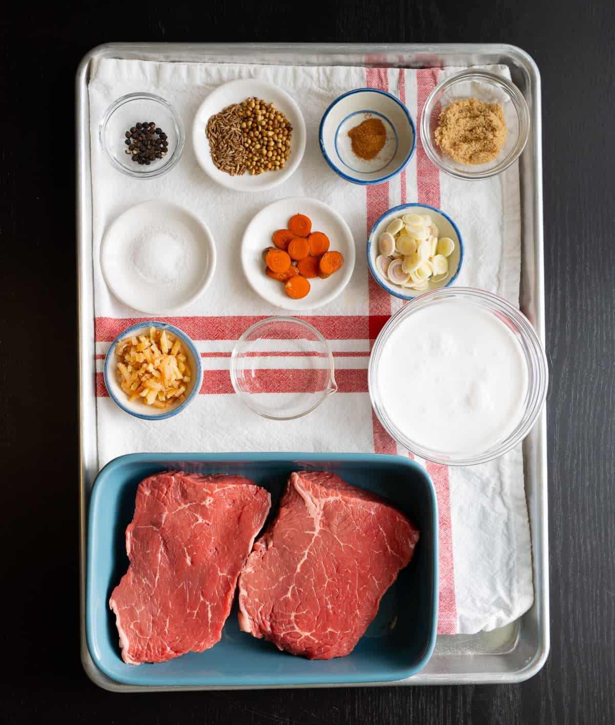 a tray of beef satay marinade ingredients