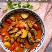 a bowl of yellow curry beef with text overlay "quick yellow curry with beef & potatoes"