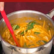 Red curry chicken being stirred in a pot, with text "30-min thai chicken curry, quick and easy recipe"