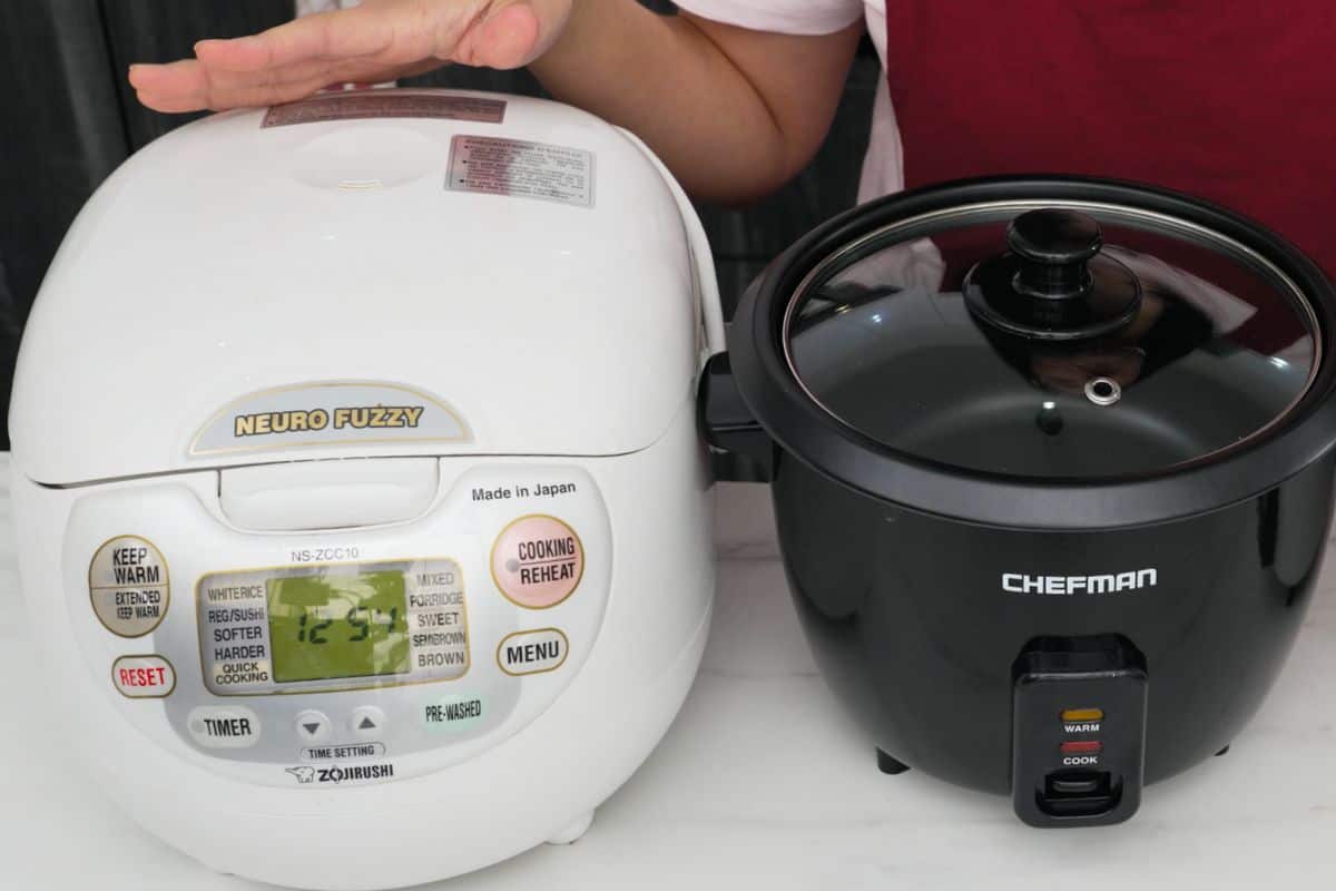 A zojirushi rice cooker and a chefman rice cooker