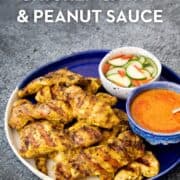 a plate of chicken satay with a bowl of peanut sauce and a bowl of cucumber pickles with text overlay "Easy no-skewer chicken satay & peanut sauce"