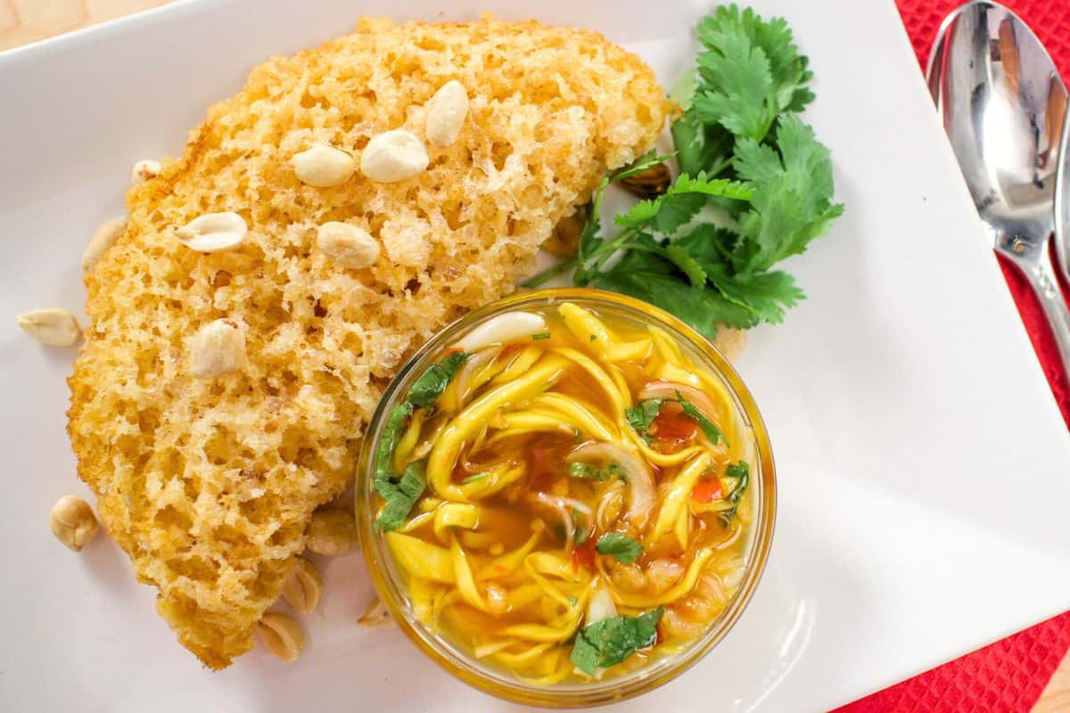 Yum Pla Duk Foo - Crispy Fish w/ Green Mango Salad - Recipe & Video