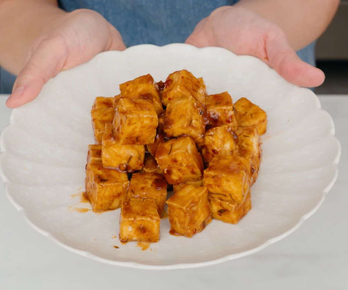 frozen firm tofu tossed in sweet chili sauce