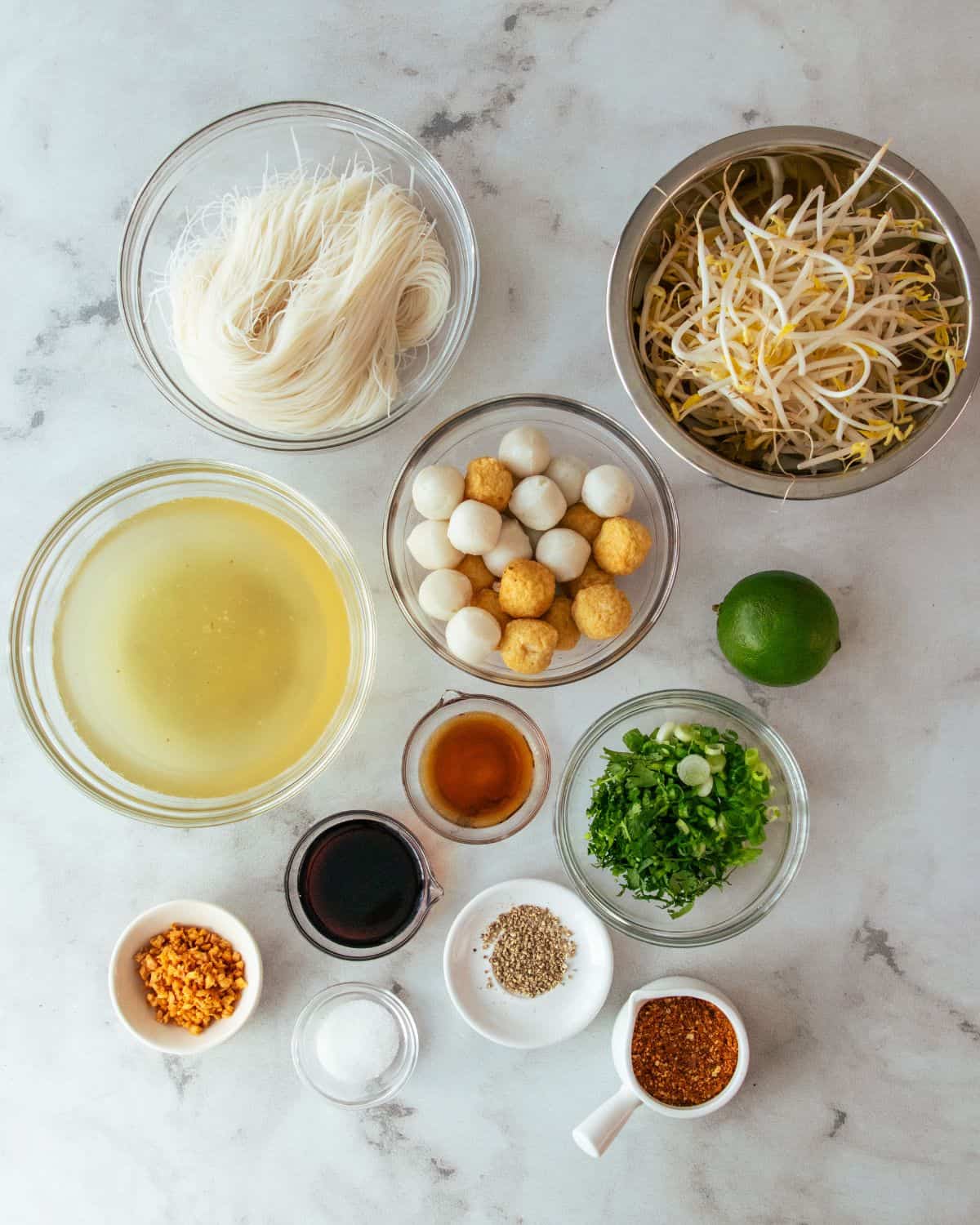 ingredients for classic Thai noodle soup with fish cakes