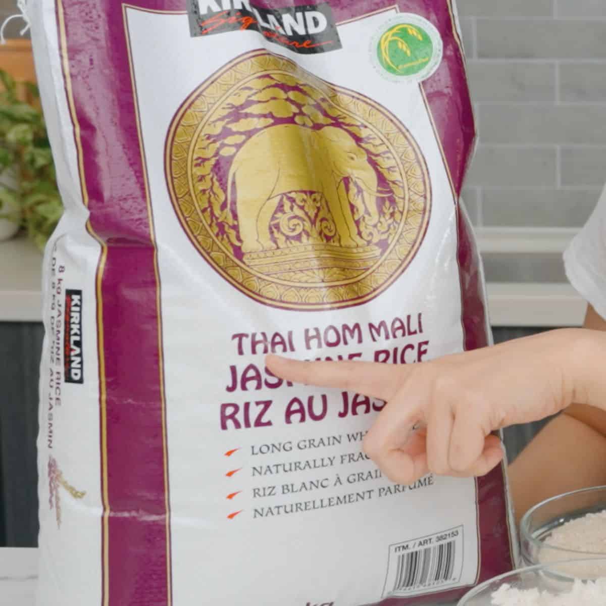 a bag of Kirkland Thai Hom Mali rice on the counter