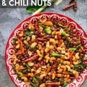 A tray of Thai nut mix with text "Thai herbs & chili nuts"