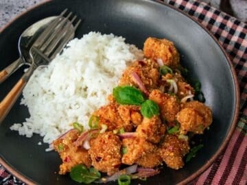 a bowl of spicy chicken rice bowl