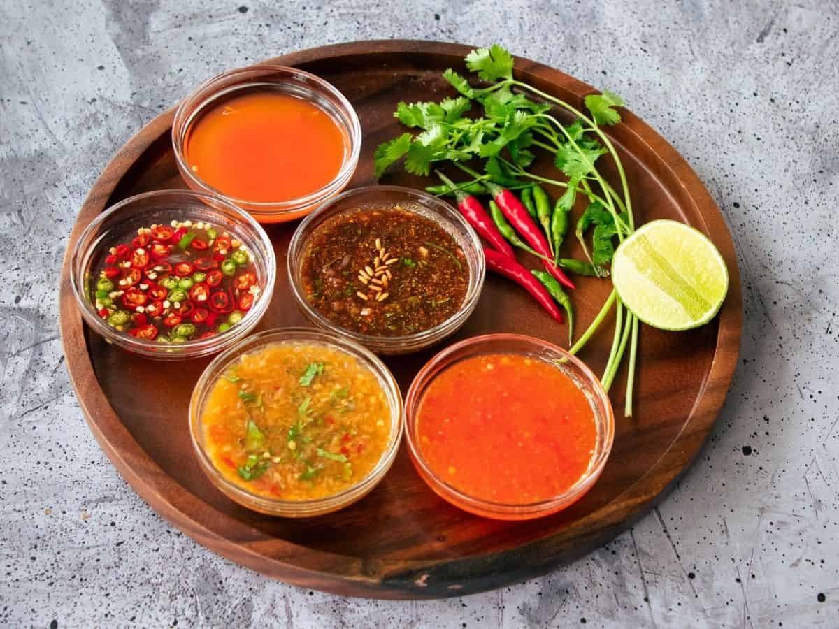 a platter of 5 Thai sauces