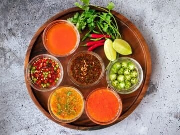 a platter of 5 Thai dipping sauces